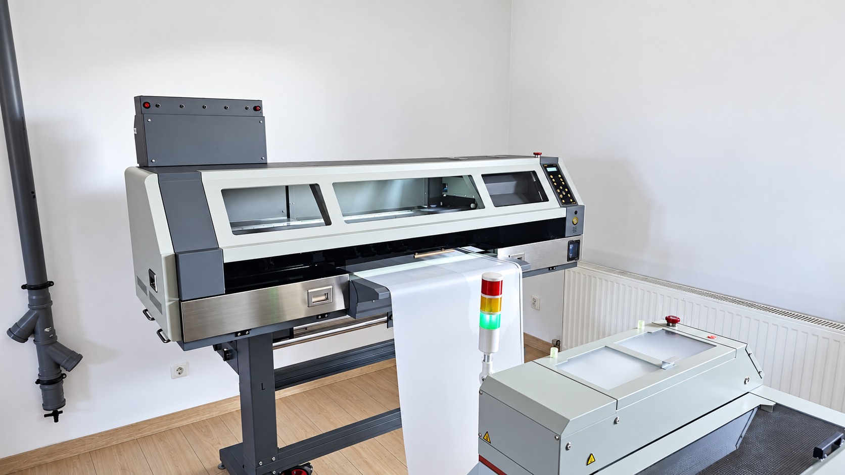 Ploter Eltron z folią prowadzoną do proszkarki