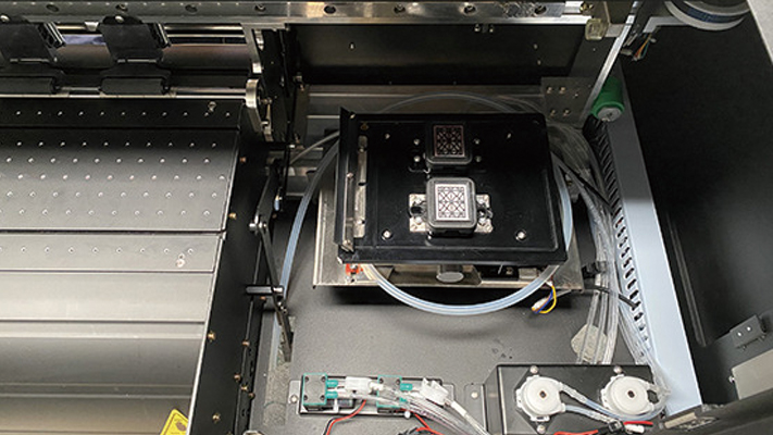 Głowice Epson I3200-A1 i stacja dokująca drukarki Eltron BF-40E2-M